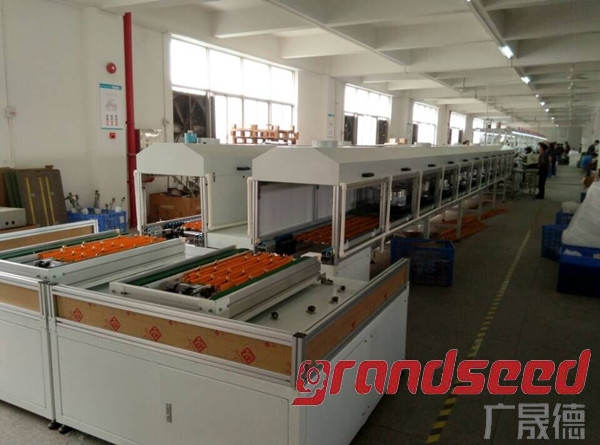 Induction cooker assembly aging production line